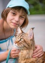 Girl with cat in park Royalty Free Stock Photo