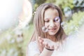 Girl catches soap bubbles