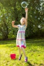 Girl Catching Soap Bubbles Royalty Free Stock Photo