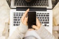 Girl with cell phone and laptop Royalty Free Stock Photo