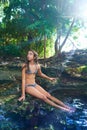 Girl in Cenote at Riviera Maya of Mexico