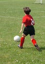 Girl Chasing Soccer Ball