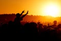 Girl cheering at outdoor music, rock festival Royalty Free Stock Photo