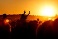 Girl cheering at outdoor music, rock festival Royalty Free Stock Photo