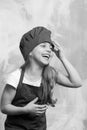 Girl in chef hat and apron Royalty Free Stock Photo