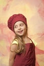 Girl in chef hat and apron Royalty Free Stock Photo