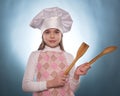 The girl with chef hat indicates isolated