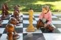 The girl and chess Royalty Free Stock Photo