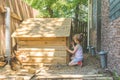 The child builds the booth for dogs