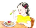 Girl child eating porridge with raspberries