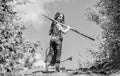 Girl child hold shovel watering can. Spring gardening checklist. Little helper. Watering tools that will solve dry yard Royalty Free Stock Photo