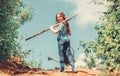 Girl child hold shovel watering can. Spring gardening checklist. Little helper. Watering tools that will solve dry yard Royalty Free Stock Photo