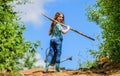 Girl child hold shovel watering can. Spring gardening checklist. Little helper. Watering tools that will solve dry yard Royalty Free Stock Photo