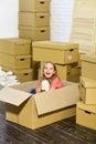 Girl child play box. Rent house. Family house. Delivering service. Apartment for family. Move out concept. Prepare for Royalty Free Stock Photo