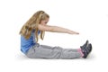 Girl child practicing yoga, working out, wearing sportswear. Happy little girl goes in for sports, studio shot.