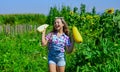 Girl child small farmer proud with harvest, homegrown is best