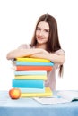 The girl child at the table with books Royalty Free Stock Photo