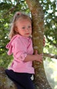 Girl child in tree Royalty Free Stock Photo