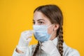 girl child wearing respirator mask to protect from coronavirus, safe Royalty Free Stock Photo