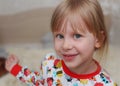 Girl children on bed in pajamas. Royalty Free Stock Photo