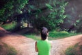 Girl with a choice near the forked road