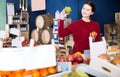 Girl choosing winesap Royalty Free Stock Photo