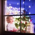 Girl at Christmas eve Royalty Free Stock Photo