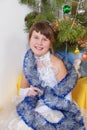 The girl at Christmas fur-tree. Royalty Free Stock Photo