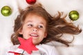 Girl with a Christmas star Royalty Free Stock Photo