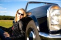 Girl and a classic car Royalty Free Stock Photo