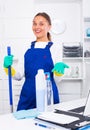 Girl cleaning at company office