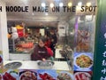 Girl Cleaning Forks at the Chinese Restaurant After the Festival Royalty Free Stock Photo