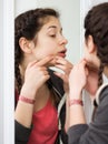 Girl cleaning pores Royalty Free Stock Photo