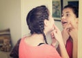 Girl cleaning pores Royalty Free Stock Photo