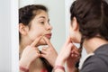 Girl cleaning pores Royalty Free Stock Photo