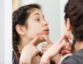 Girl cleaning pores Royalty Free Stock Photo