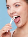 Girl cleaning tongue. Dental care oral hygiene.