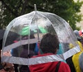 Girl With Clear Plastic Umbrella In Rain Shower