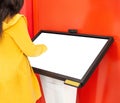 The girl clicks on the touch screen of the information assistant and help in the bank, copy space. Place for text