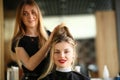 Girl Client Getting Hairstyle by Hairdresser