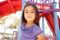 Girl On Climbing Frame In Park Royalty Free Stock Photo