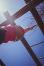 Girl climbing monkey bars during obstacle course training Royalty Free Stock Photo