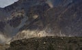 The girl climbing the mountains around the village to notice the return of the men from the mountains Royalty Free Stock Photo