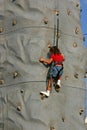 Girl Climbing Rock Wall Royalty Free Stock Photo