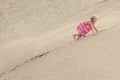 Girl Climbing On The Sand dune. Summer day Royalty Free Stock Photo