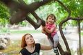 Girl climbing tree