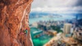 A girl climbs a climbing route Royalty Free Stock Photo