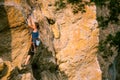 The girl climbs the rock Royalty Free Stock Photo