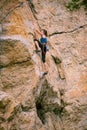 The girl climbs the rock Royalty Free Stock Photo