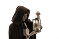 Girl in cloak with a candle-lantern